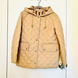 Burberry Quilted Parka
In a pristine condition